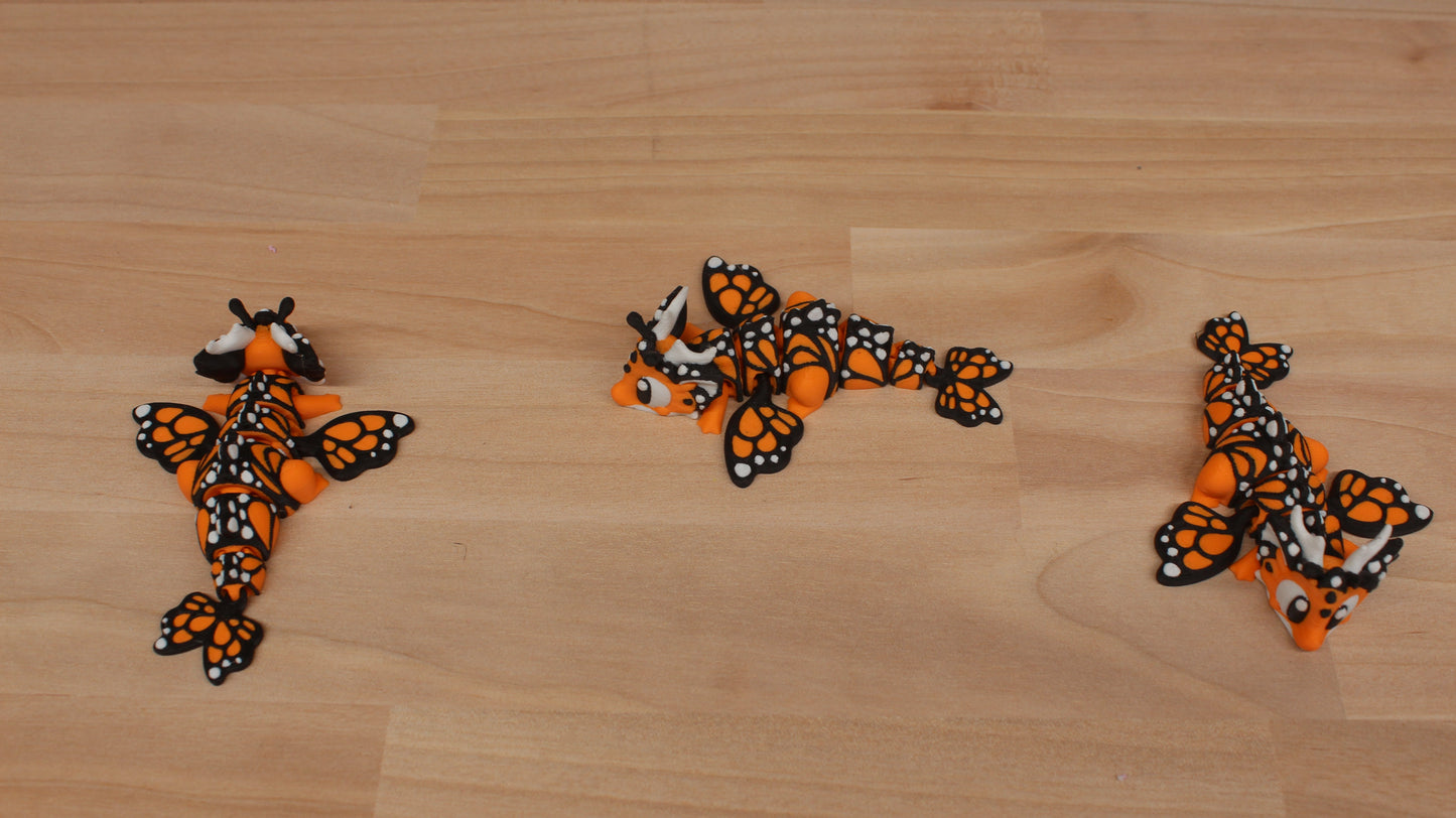 Mini Dragon Butterfly – Articulating Fidget Toy – Bright Orange Edition