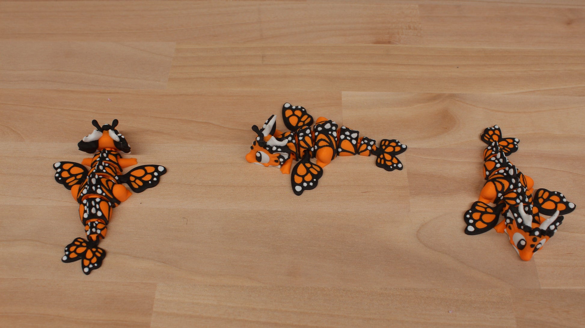 Mini Dragon Butterfly – Articulating Fidget Toy – Bright Orange Edition