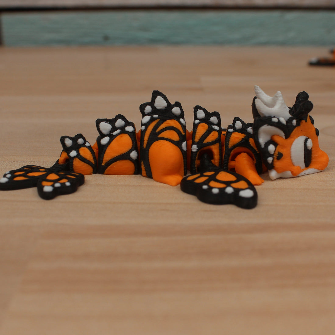 Mini Dragon Butterfly – Articulating Fidget Toy – Bright Orange Edition
