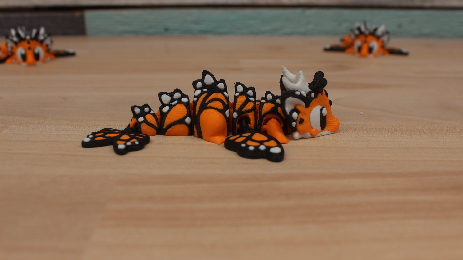 Mini Dragon Butterfly – Articulating Fidget Toy – Bright Orange Edition