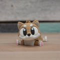 3D printed articulated brown dog figurine inspired by Odis breed
