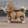 3D printed articulated brown dog figurine inspired by Odis breed