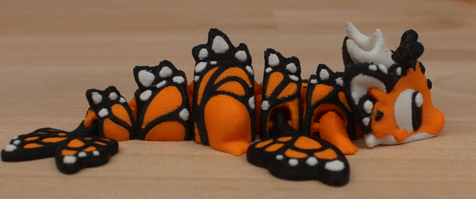 Mini Dragon Butterfly – Articulating Fidget Toy – Bright Orange Edition